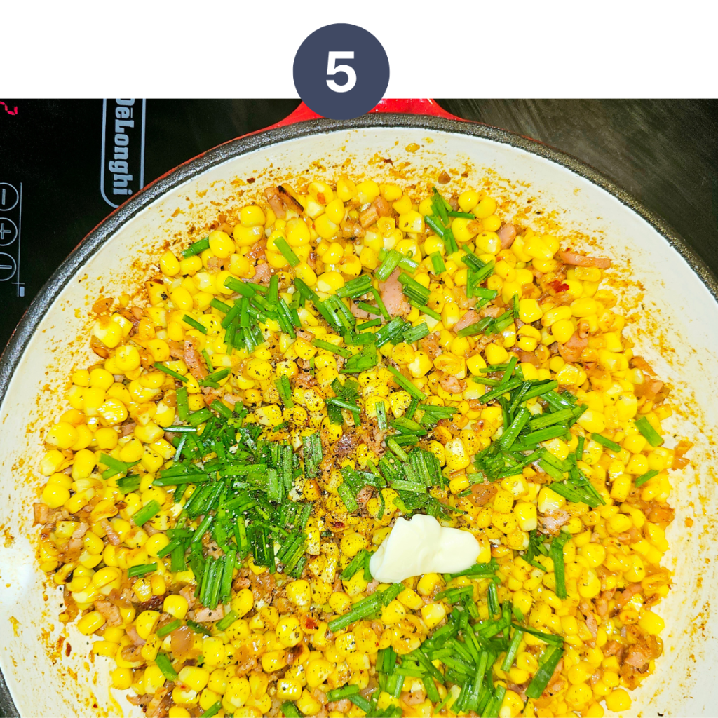 fry the corn till golden brown and the add butter, chives, salt and pepper