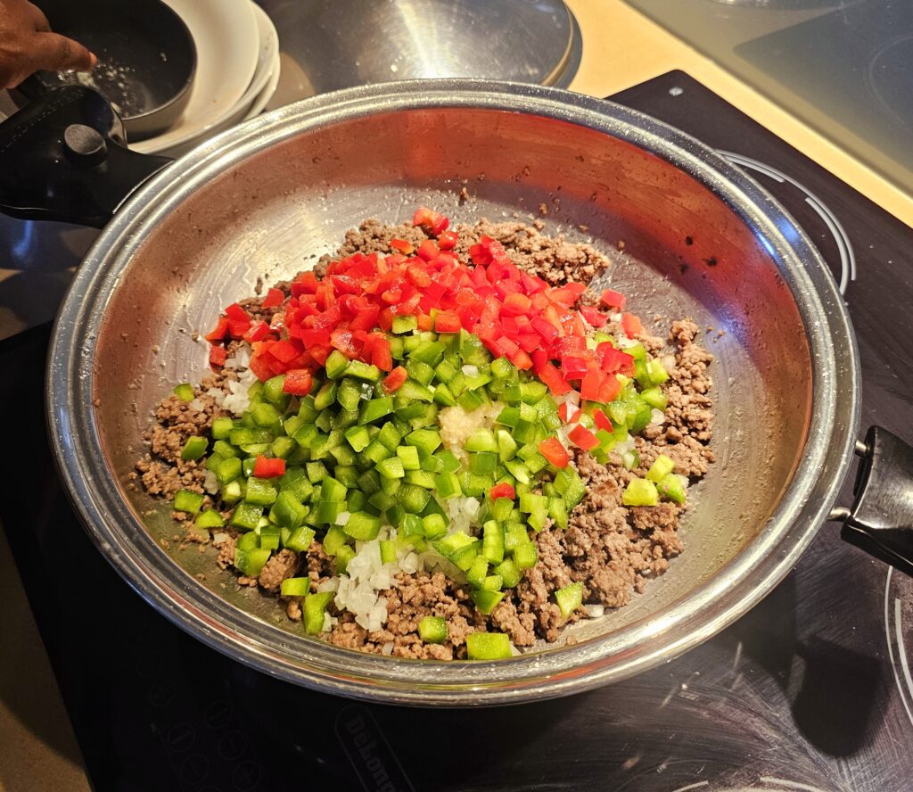 add bell pepper, onion and garlic 