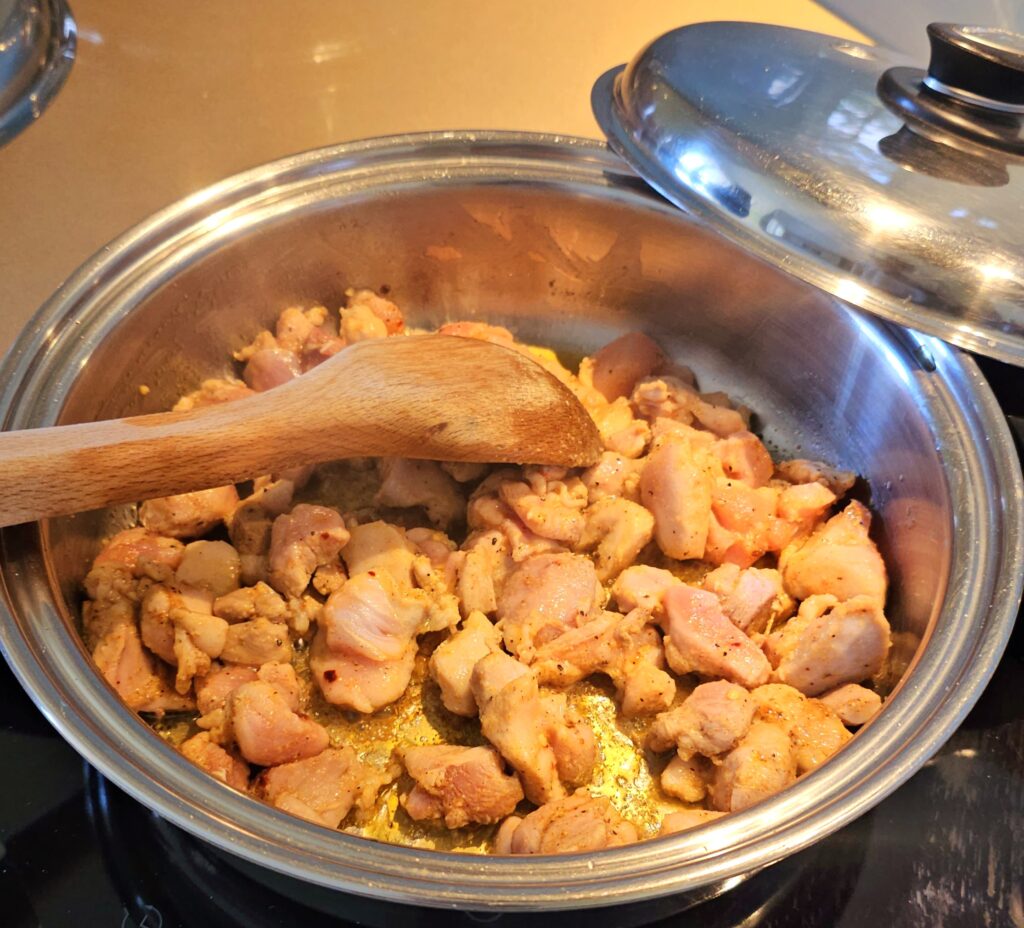 cooked diced chicken till browned 