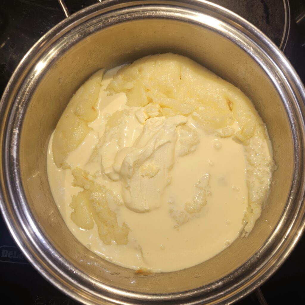 add-cream-milk-and-mash