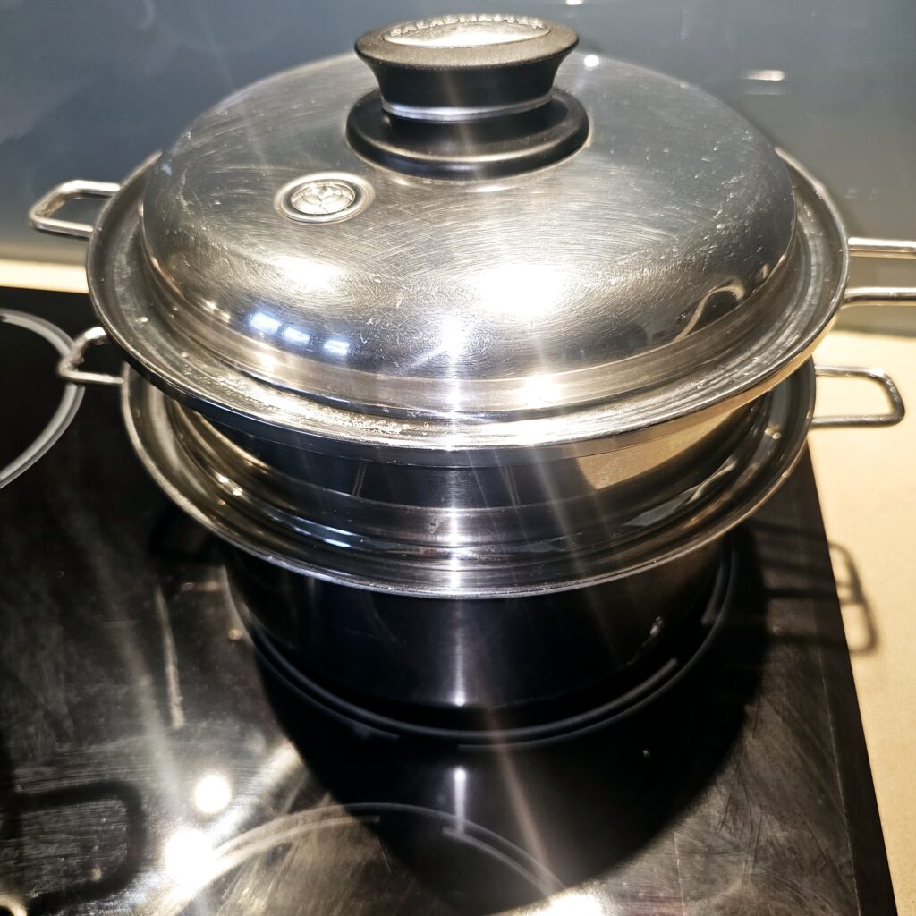 put potatoes in a steamer and close lid